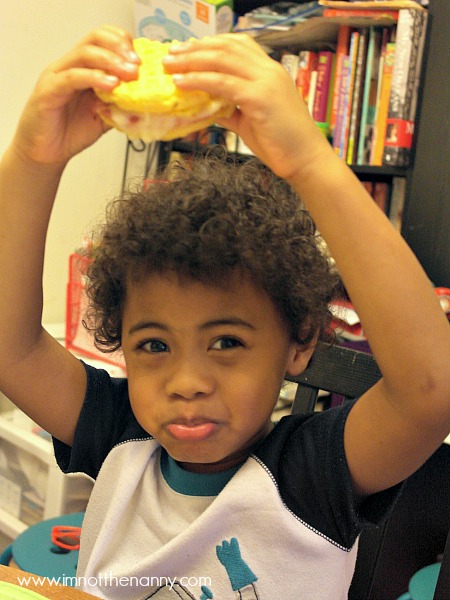 Jaxson eating frozen waffle sandwich #shop #4MoreWaffles at I'm Not the Nanny