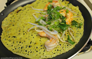 bánh xèo cooking with shrimp filling