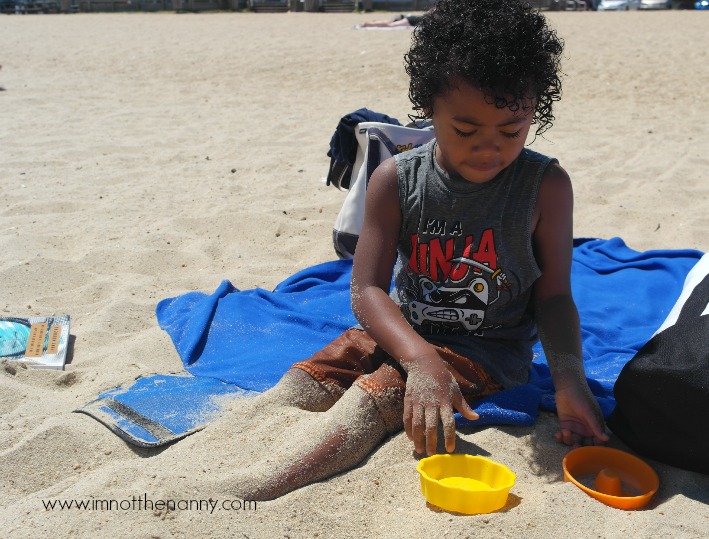 Jaxson legs in sand Breezy Point Beach-I'm Not the Nanny