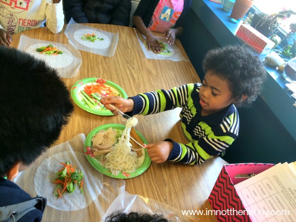 Jaxson helping with spring rolls