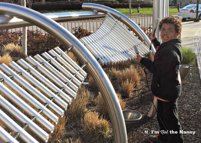 Jaxson playing giant xylophone
