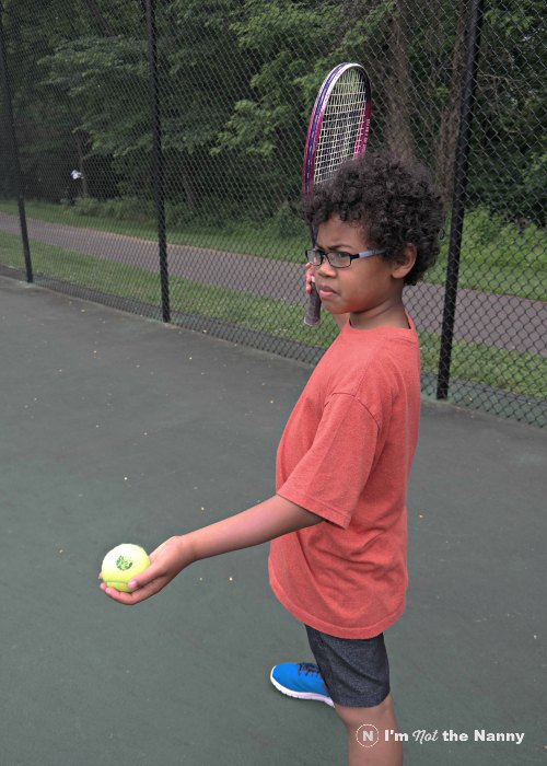 Jaxson playing tennis