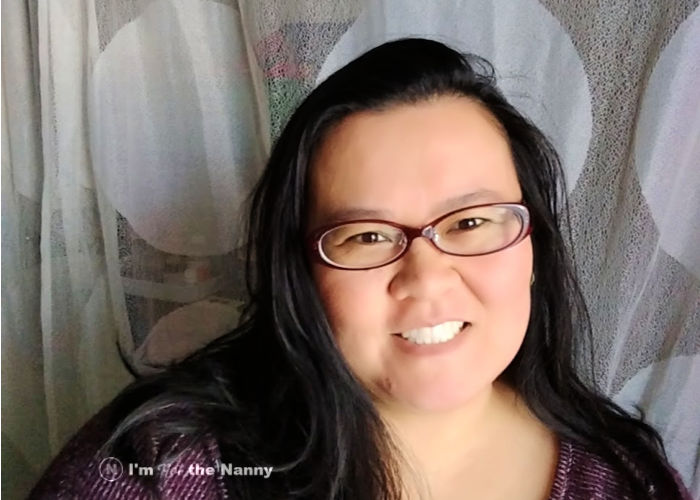 Thien-Kim with red glasses